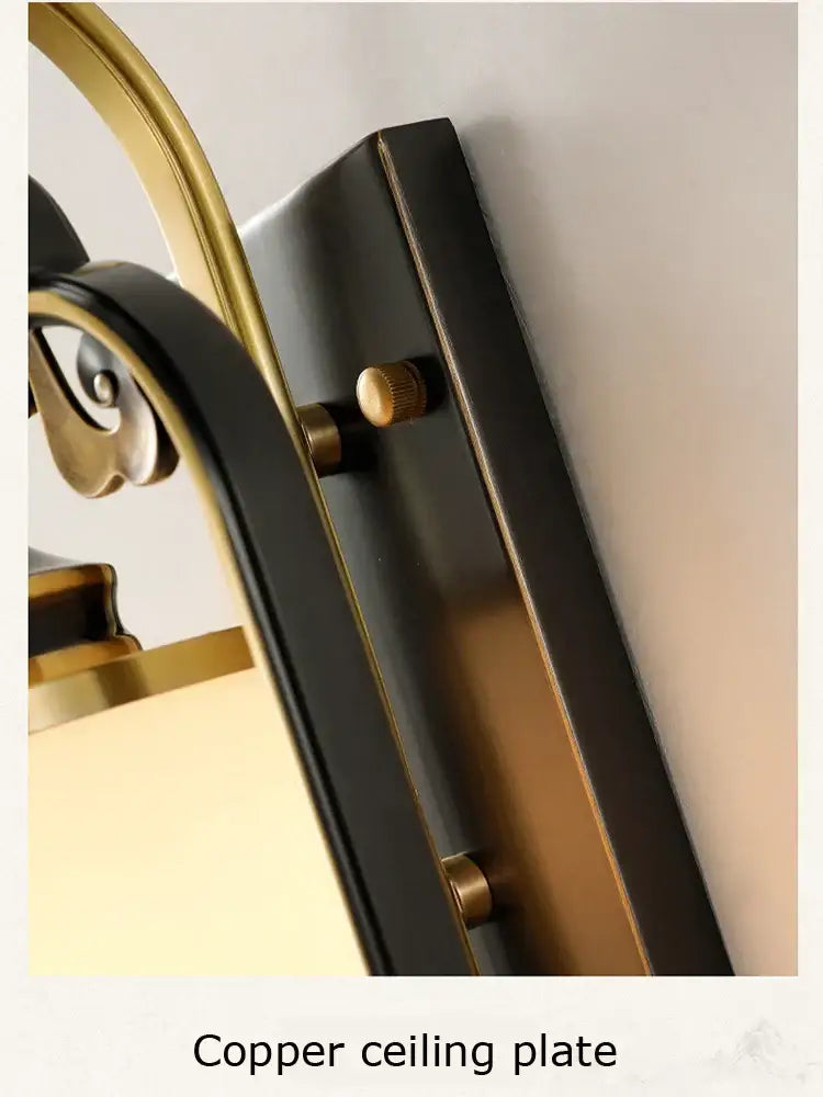 Decorbites™ all copper wall lamp with black and gold copper ceiling plate and ornate curved arms for living room use