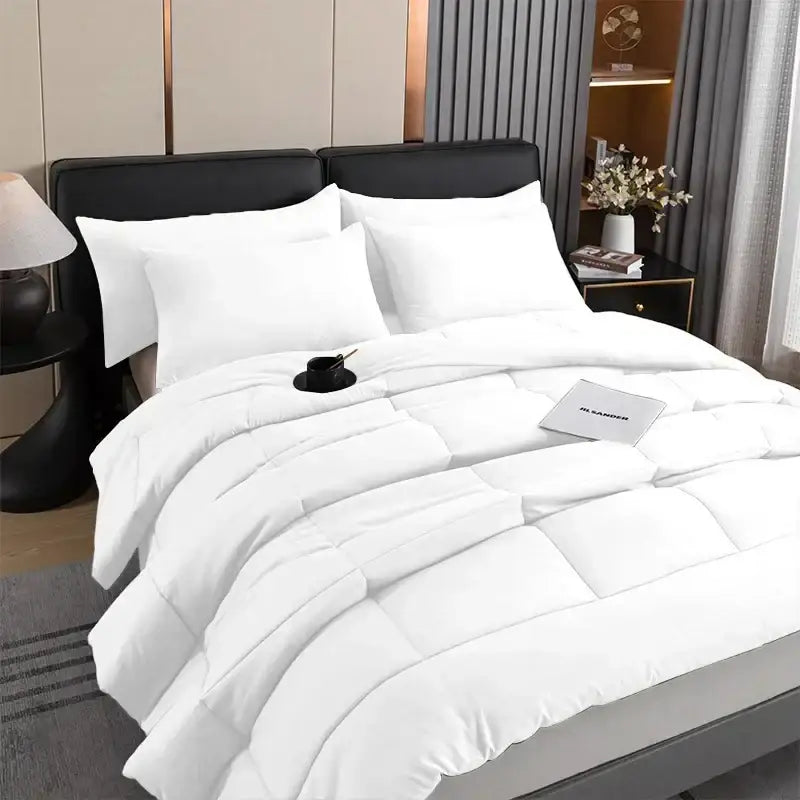 White quilted comforter set by decorbites with plush soft texture and clean lines for all-season use queen king size