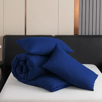 Royal blue quilted duvet set by DecorBites all-season queen and king size comforter with matching pillowcases neatly arranged