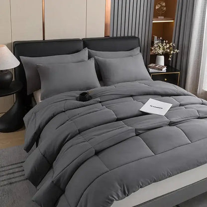 Gray DecorBites™ all-season quilted duvet set with plush texture and square stitched panels for queen and king beds