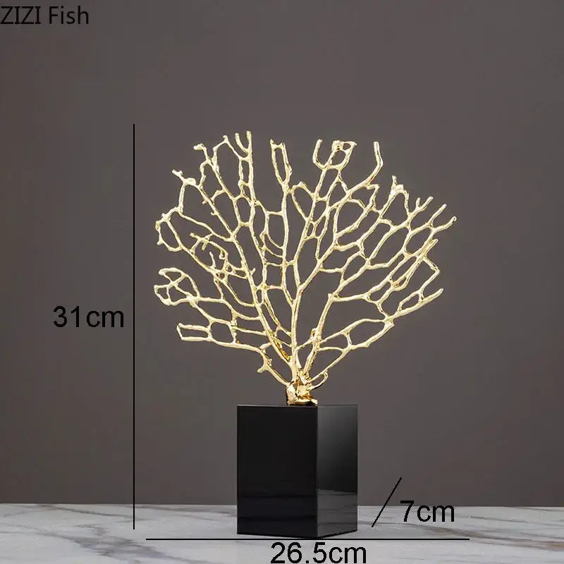 Gold-colored metallic alloy coral crafts on a black crystal base for stylish desktop decor by DecorBites