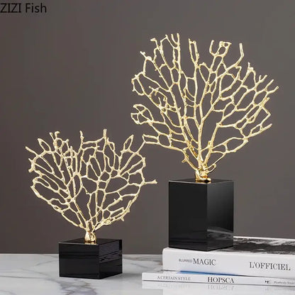 Golden alloy coral crafts with intricate branching designs mounted on sleek black crystal base for stylish desktop decor
