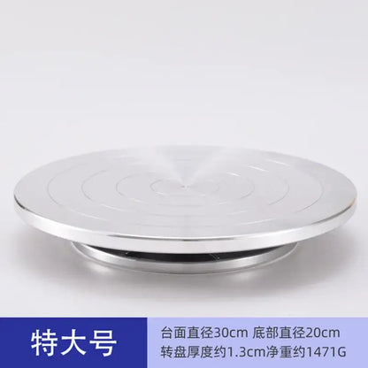 Silver metallic aluminum alloy turntable with concentric grooves for clay sculpture and pottery wheel rotation by DecorBites
