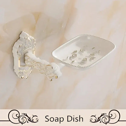 White ornate aluminum soap dish with scalloped edge and floral detailing from decorbites bath hardware set