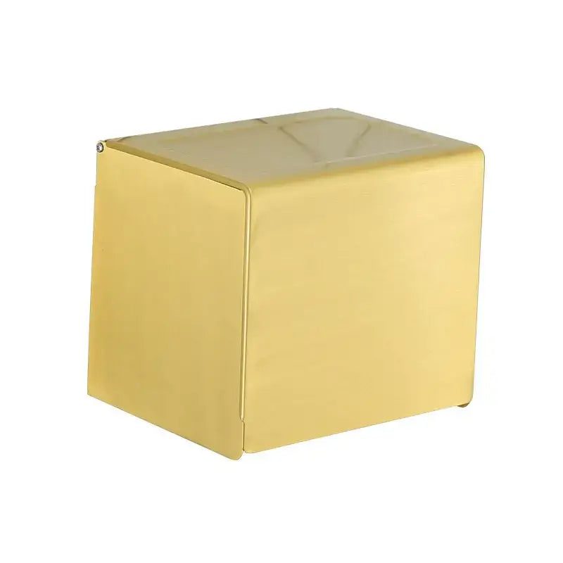 Decorbites aluminum brushed gold cube-shaped ottoman with smooth surface used as a toilet paper holder rack