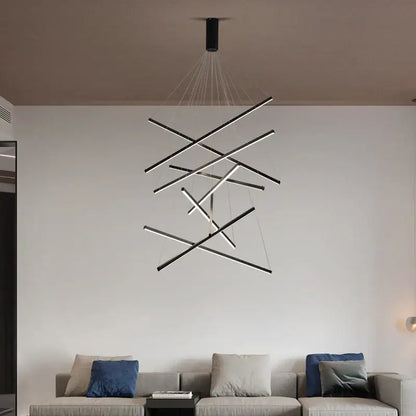 Modern black and white aluminum ceiling chandelier with intersecting rods and LED changeable shape design suspended by cables