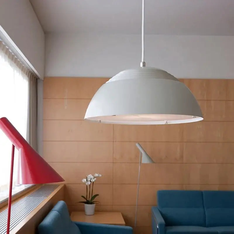 White dome-shaped decorbites aluminum pendant lamp with sleek minimalist design for dining room or kitchen island
