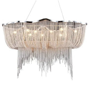 A modern silver-toned decorbites aluminum tassel chandelier with scalloped frame and cascading metallic chains for living room