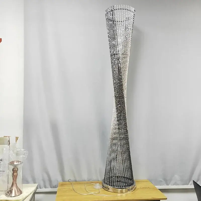 Decorbites aluminum tower floor lamp with twisted beaded design in silver and clear crystal accents for living room use