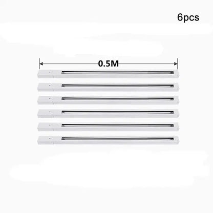 Six white led strip lights with a slim profile and black channel on decorbites aluminum track rails for spotlights