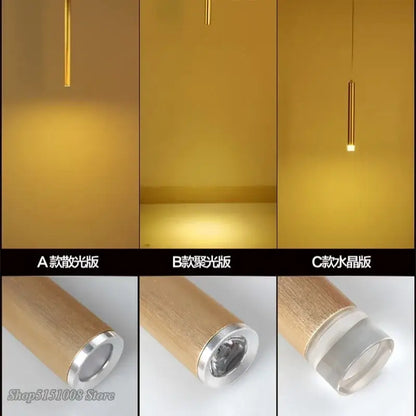 A decorbites pendant light with a modern cylindrical wooden finish and aluminum accents for dining room and kitchen decor