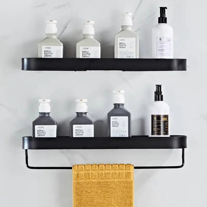 Decorbites aluminum black metal bathroom shelf with towel bar and corner storage shelf holding lotion bottles