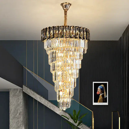 Decorbites™ amber crystal chandelier with cascading clear and black rectangular prisms suspended by gold-toned chain