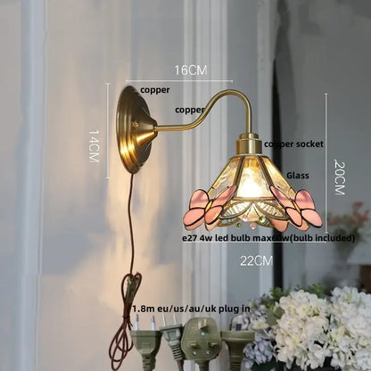 Antique brass copper wall sconce with amber flower glass butterfly design and included led bulb for living room use