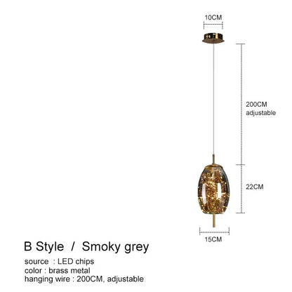 DecorBites™ amber glass chandelier with smoky grey glass pendant and brass accents for luxury lighting