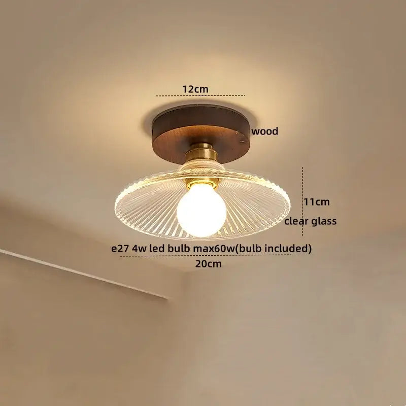 DecorBites amber glass led ceiling light with dark wood base brass accents and clear ribbed glass shade for kitchen balcony