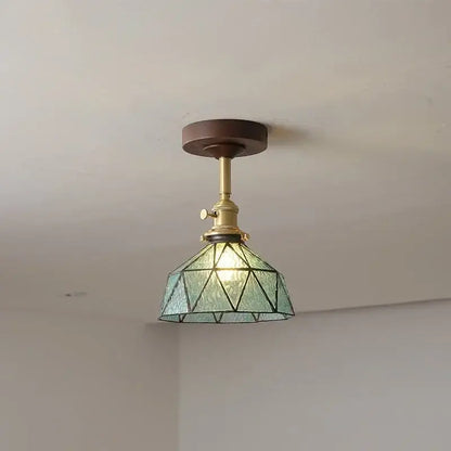 Decorbites™ amber glass led ceiling light with brass-finished metal fixture and green geometrically patterned glass shade