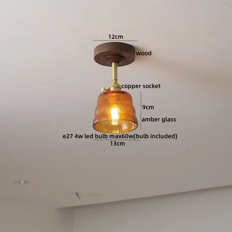 Decorbites amber glass led ceiling light with warm amber glass, copper socket, and modern wood canopy for kids room