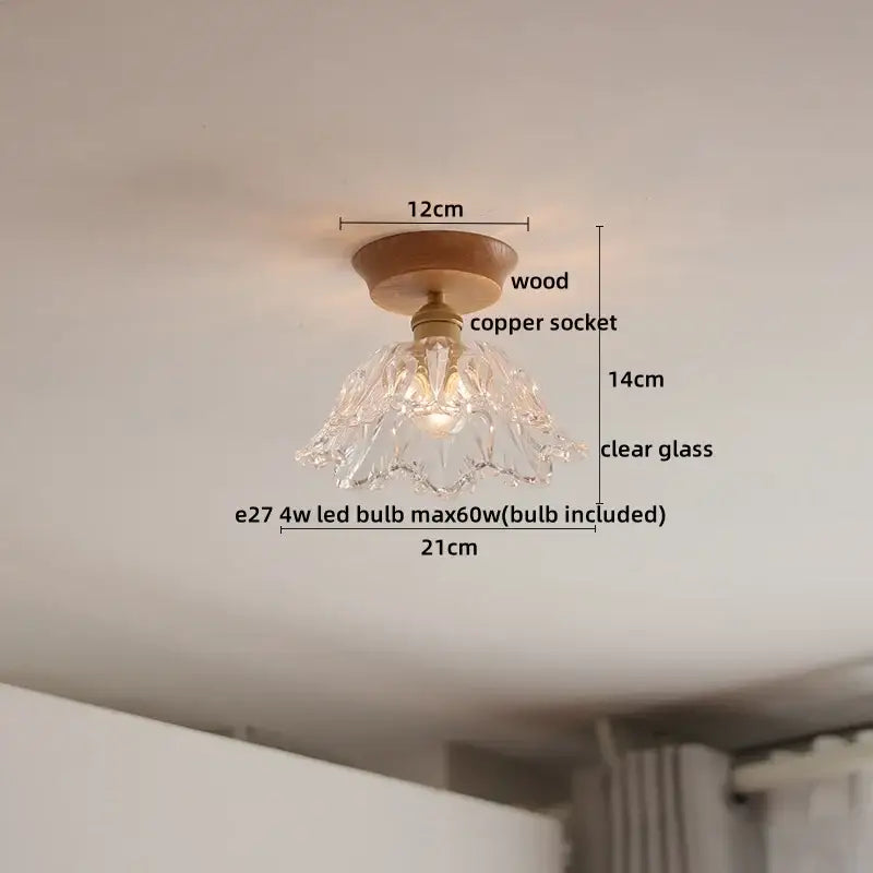 A delicate decorbites amber glass led ceiling light with fluted design and warm wooden base for modern decoration
