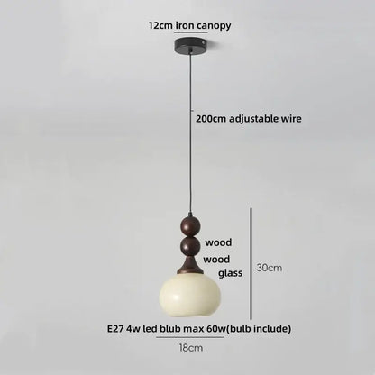 Minimalist decorbites amber glass pendant light with dark bronze wood globe and adjustable black wire suspension for rustic interiors