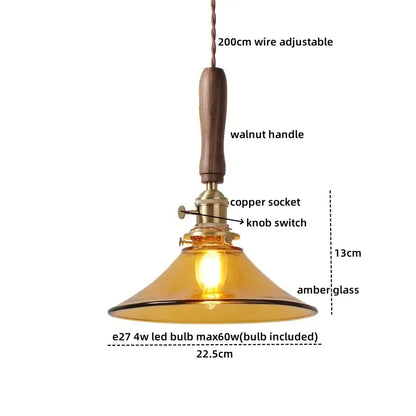 Decorbites amber glass led pendant light with warm amber glass, walnut handle, and copper socket for dining room