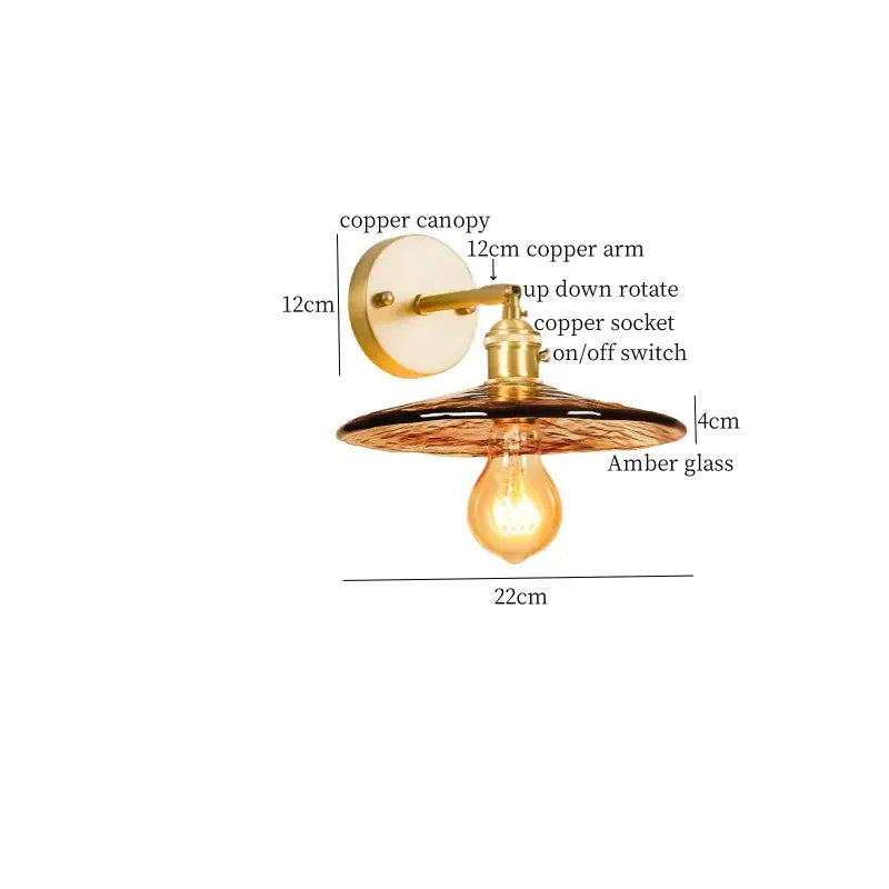Copper wall lamp with amber glass shade and visible filament bulb featured in DecorBites™ led wall lamp