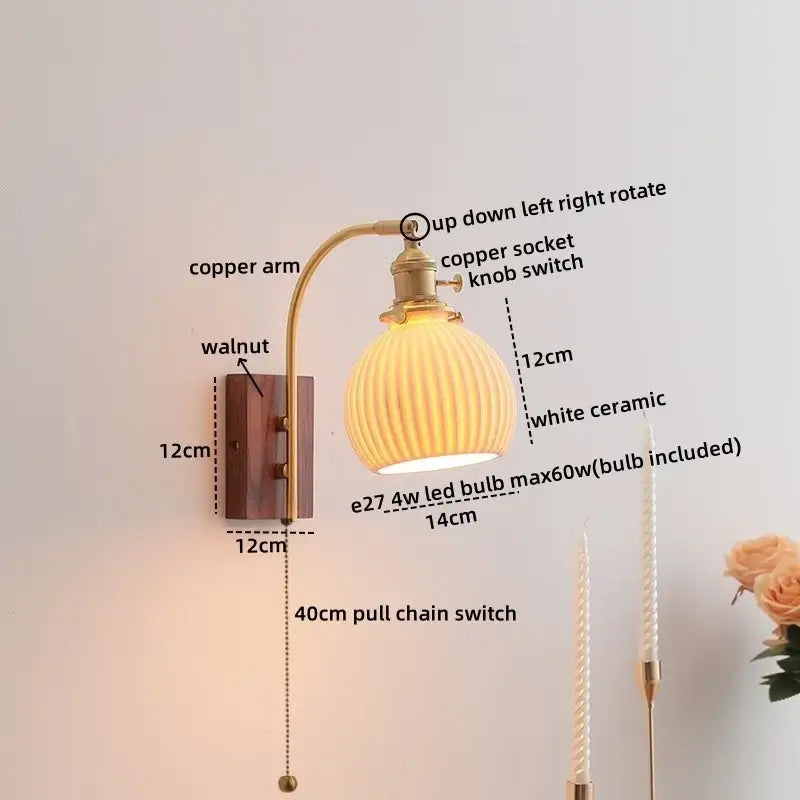 DecorBites amber glass LED wall lamp with warm-toned ribbed white ceramic, copper arm, and walnut mounting plate