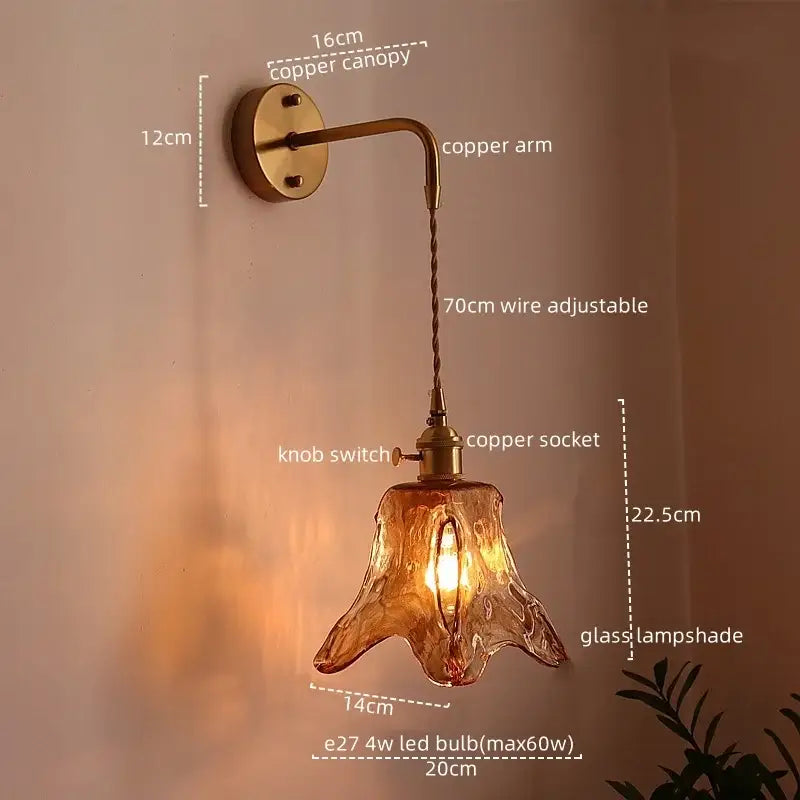 Copper wall lamps by DecorBites amber glass featuring a hand-blown amber glass led shade with adjustable twisted wire