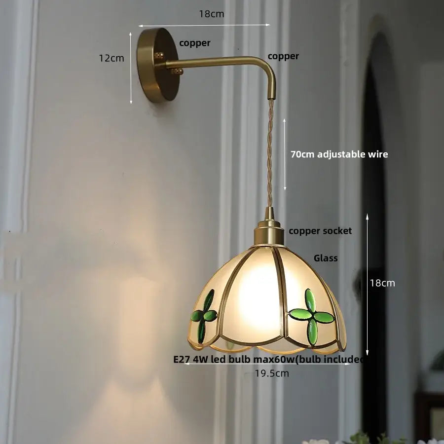 Decorbites amber glass led wall light with antique brass finish stained glass shade featuring green clover motifs