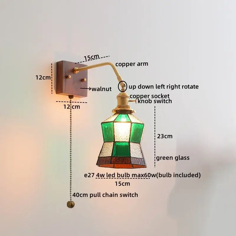 Vintage-style wall sconce with copper arm, walnut mounting plate, and green stained glass shade by DecorBites amber glass