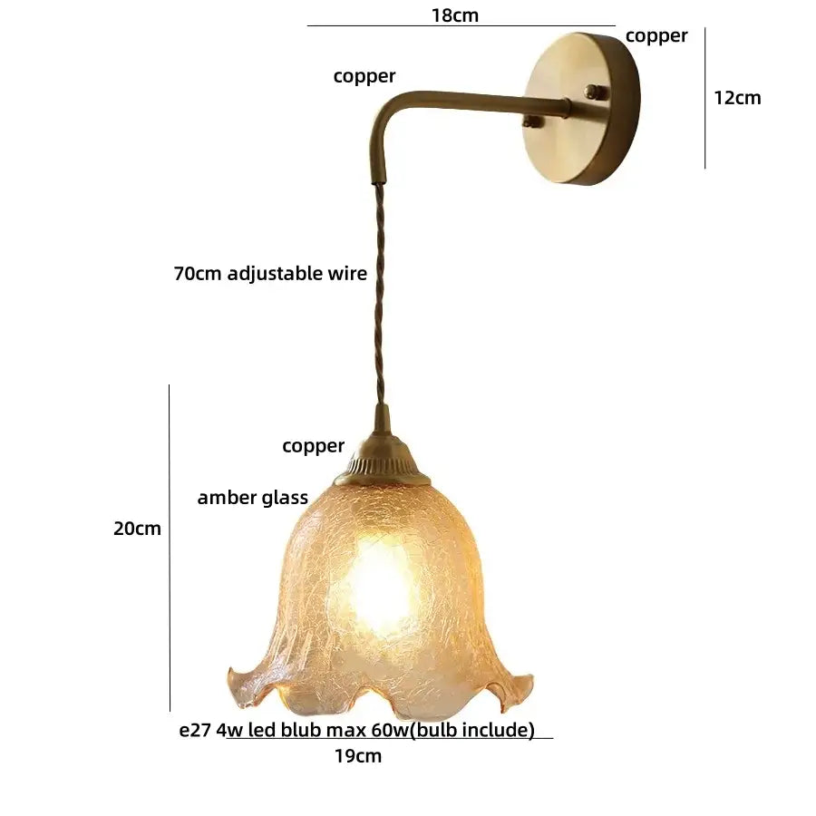 Antique brass copper wall sconce with textured amber glass bell-shaped shade from decorbites amber glass led collection