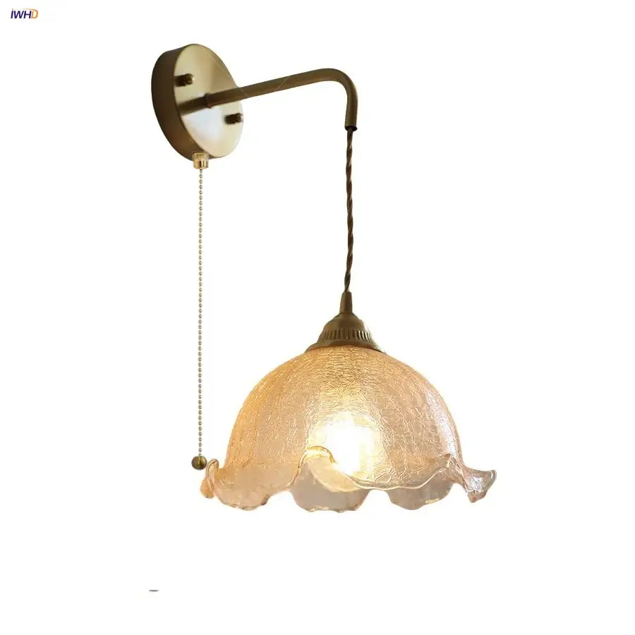 Antique brass wall sconce with DecorBites amber glass led ruffled shade and ornate metal fixture for bedroom and bathroom