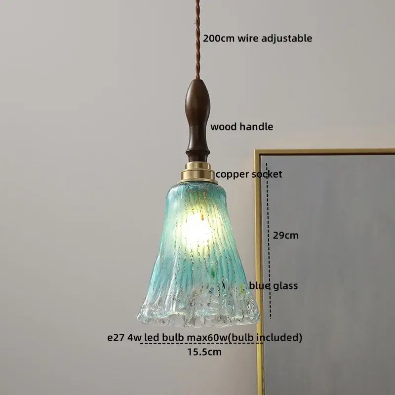 Decorbites amber glass pendant lamp with a blue glass bell-shaped shade wooden handle and copper socket for modern decor