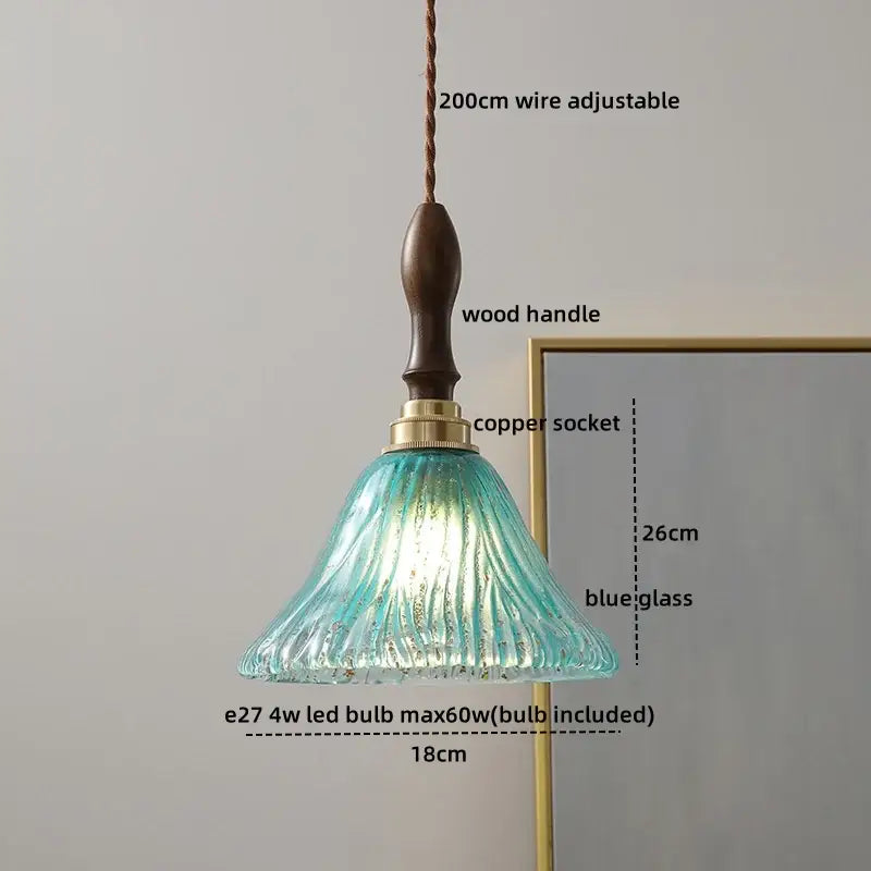 Teal blue textured glass pendant light with wooden handle and copper socket by decorbites amber glass pendant lamps