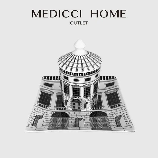 White ceramic candlestick with black detailing resembling ancient roman architecture for luxury home decor