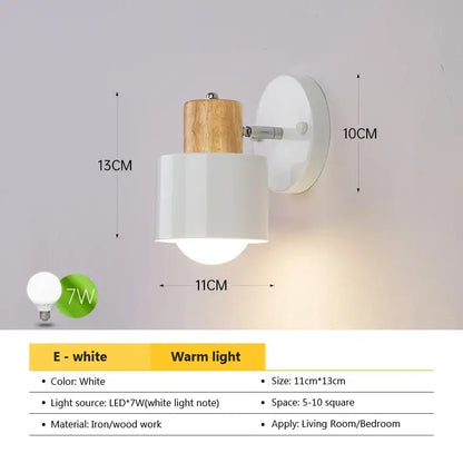 White decorbites™ angel adjustable led wall sconce with cylindrical shade, wooden top cap, and iron mounting plate