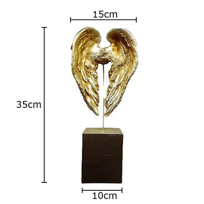Decorbites™ golden angel wings sculpture with textured metallic finish on dark brown base wings sculpture desk decor