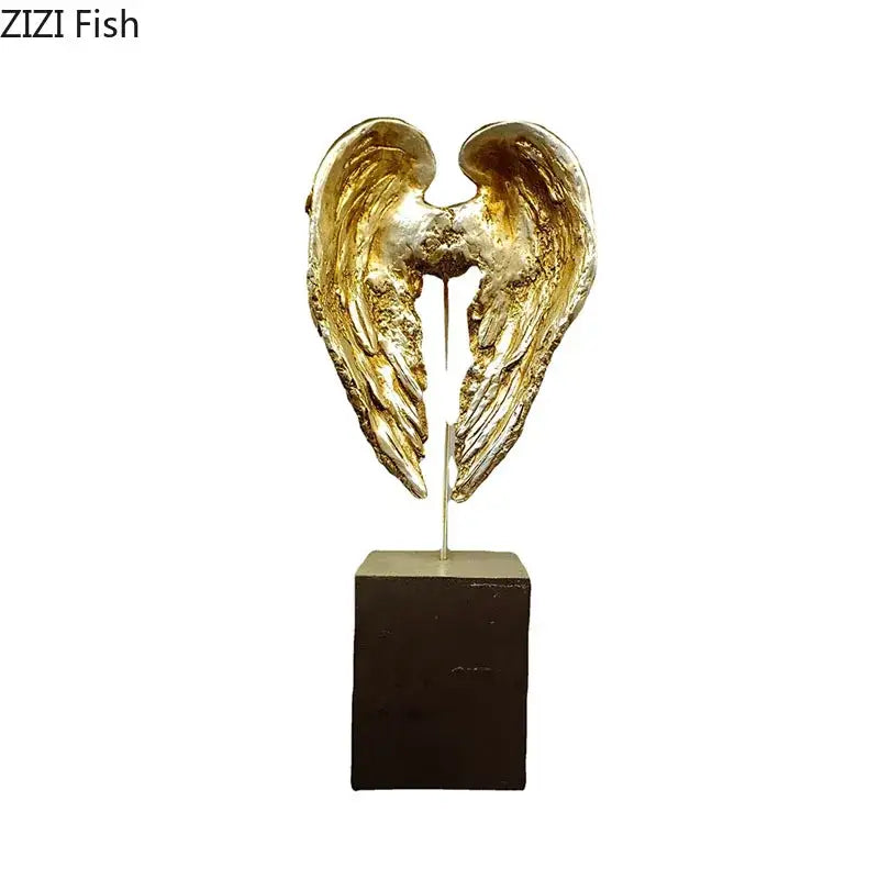 Golden angel wings sculpture on a dark brown pedestal base wings sculpture desk ornament by DecorBites™