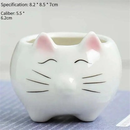 White ceramic cat-shaped animal cartoon ceramic planter with pink ears and black whiskers for nursery planting