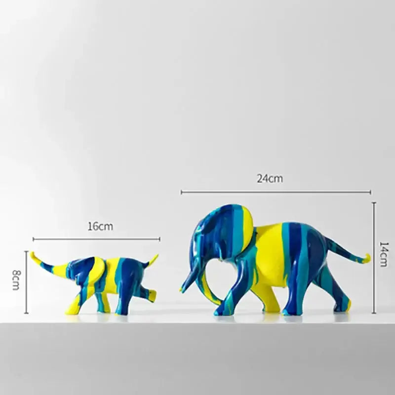 Vibrant blue and yellow striped resin elephant figurines from decorbites animal resin statue collection