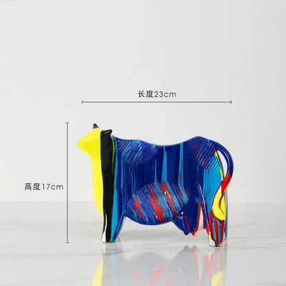 Vibrant blue yellow and red glossy glass animal resin statue from DecorBites resin statue collection