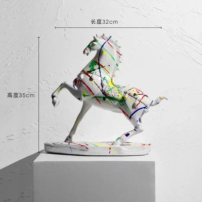 White ceramic horse sculpture with vibrant abstract paint splatters in the decorbites animal resin statue collection