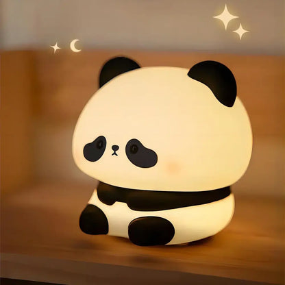 DecorBites™ animal silicone night light shaped like a cute panda with soft white LED glow and black accents