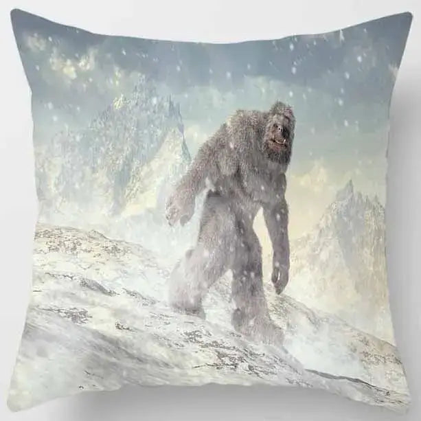 A decorbites animals world pillow case featuring a gray-furred bigfoot in a snowy mountain landscape under a cloudy sky
