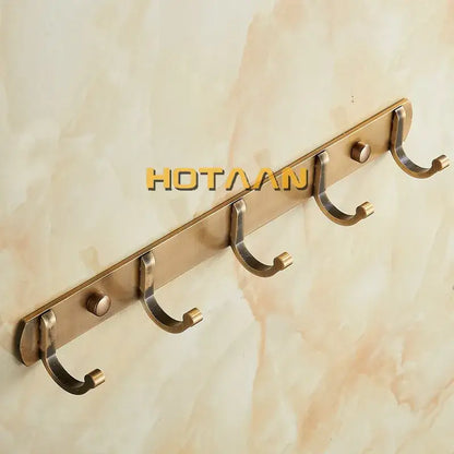 Brass-finished decorbites antique black robe hook wall-mounted with five curved hooks and decorative round knobs