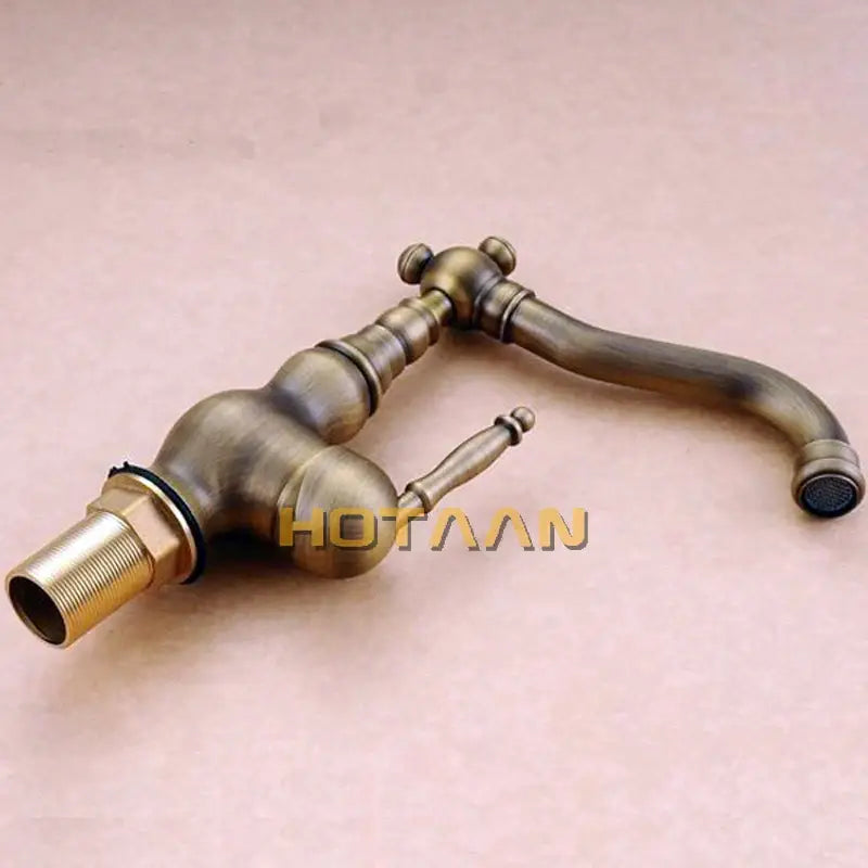 DecorBites™ antique brass basin faucet with ornate vintage design and single lever handle for bathroom use