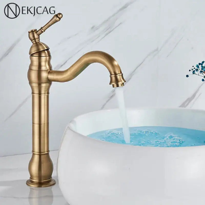 Decorbites antique brass basin faucet single handle with curved spout and decorative ridged body for sink use