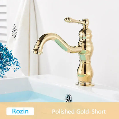 Polished gold antique brass basin faucet with classic ornate design and curved spout by DecorBites antique brass