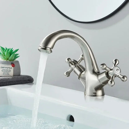 Decorbites antique brass basin faucet with stainless steel two-handle curved spout and cross-shaped knobs