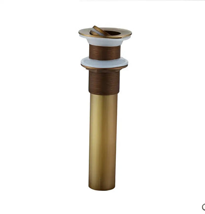 Decorbites™ antique brass basin sink drain with white ceramic flange and threaded metal body for basin sink use